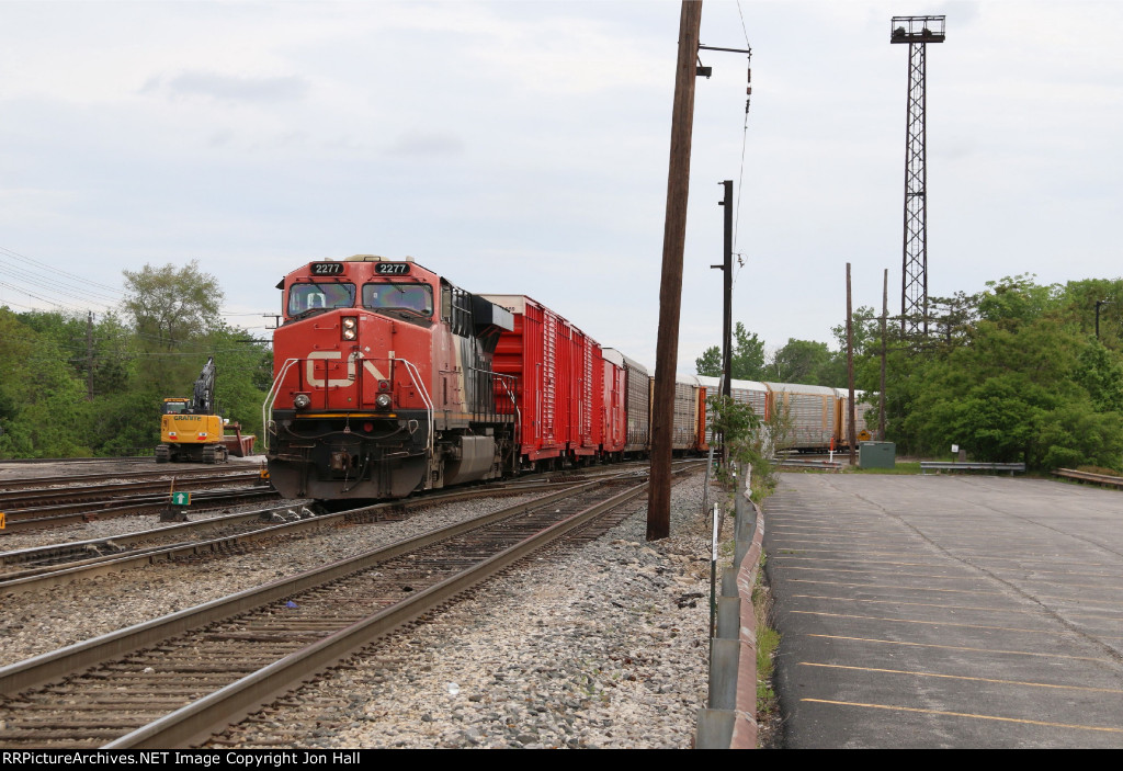 CN 2277 pulls out the south end as it doubles Q11651 in to the yard